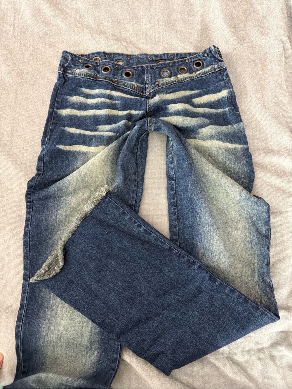 Vintage Indulgence flare jeans with grommet detailing
Sz 5/6 Y2K style